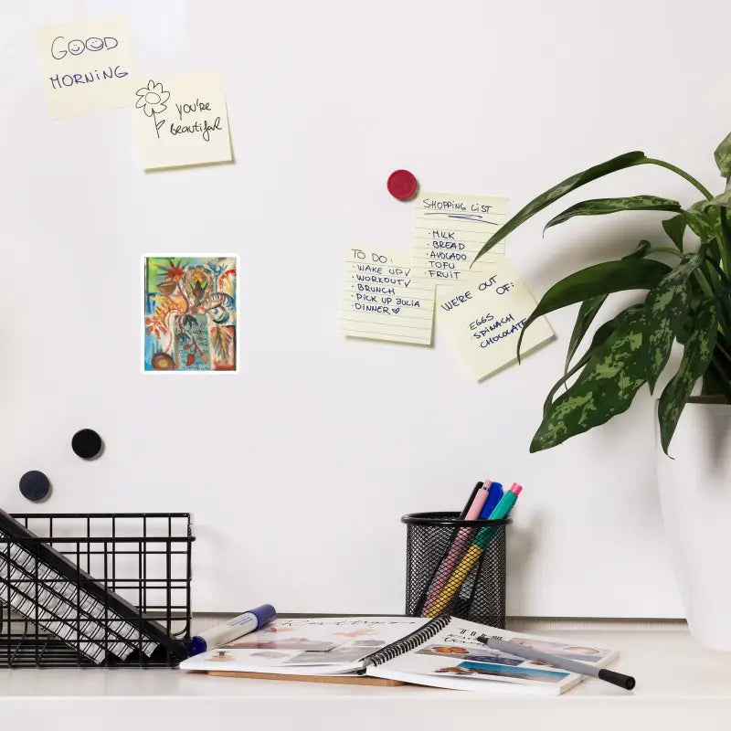 Organized desk workspace with a magnet featuring Matthew Dye’s artistic elegance