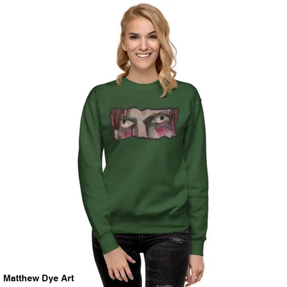 Green sweatshirt featuring an eye graphic, embodying urban elegance and classic sweatshirt silhouette