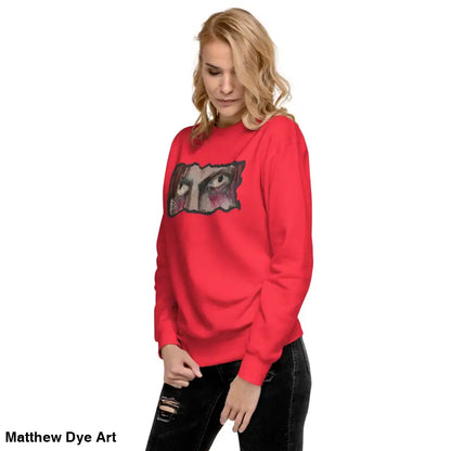 Red sweatshirt featuring an eye graphic, a timeless piece enriched with urban elegance