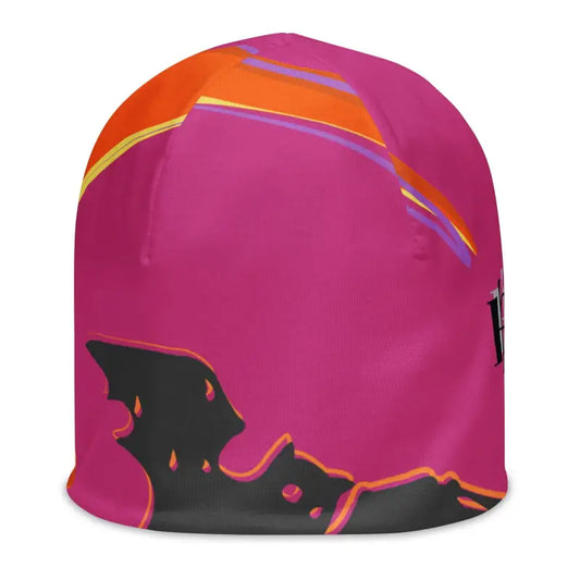 Pink winter beanie hat featuring orange and black abstract design for whimsical fall days