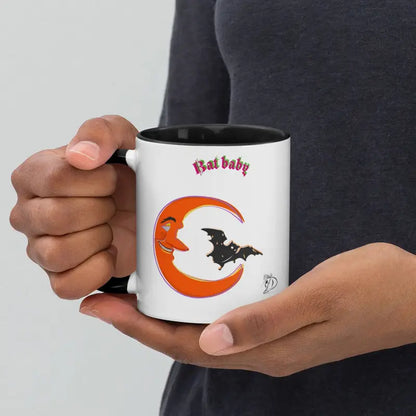 Whimsical Bat Baby Mug featuring a black bat silhouette and vibrant orange crescent design