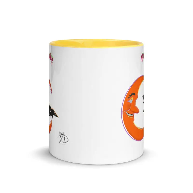 White ceramic bat baby mug featuring vibrant orange crescent and decorative black bat silhouette