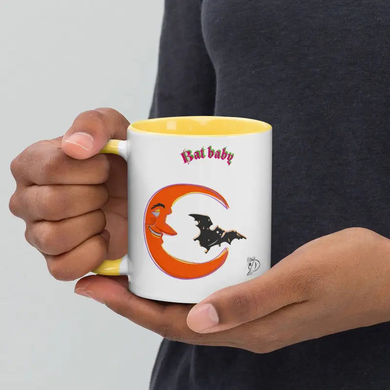 White coffee mug featuring vibrant orange crescent and black bat silhouette with Flat baby text