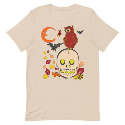 Beige unisex t-shirt featuring Halloween skull, owl, bats, and autumn art scene design