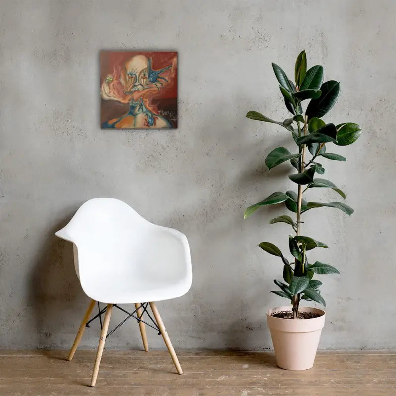 White molded plastic armchair with wooden dowel legs beside Haunted Canvas Print display