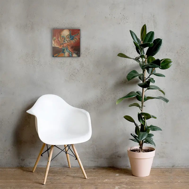 Modern white molded plastic armchair with wooden legs beside haunted canvas print