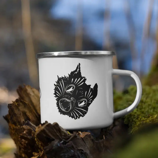 White enamel camping mug featuring a black feather design from Ah Kitty for autumn brews