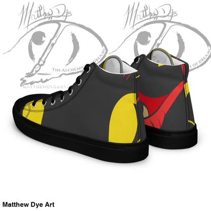 High-top sneakers featuring a black, yellow, and red geometric design, ideal for vintage black cat enthusiasts