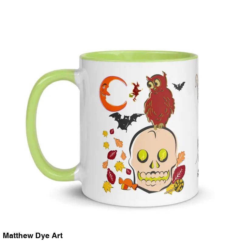 White ceramic mug with lime green handle featuring Halloween owl and skull artwork
