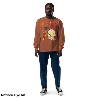 Man in a Halloween-themed sweatshirt featuring an owl and skull design