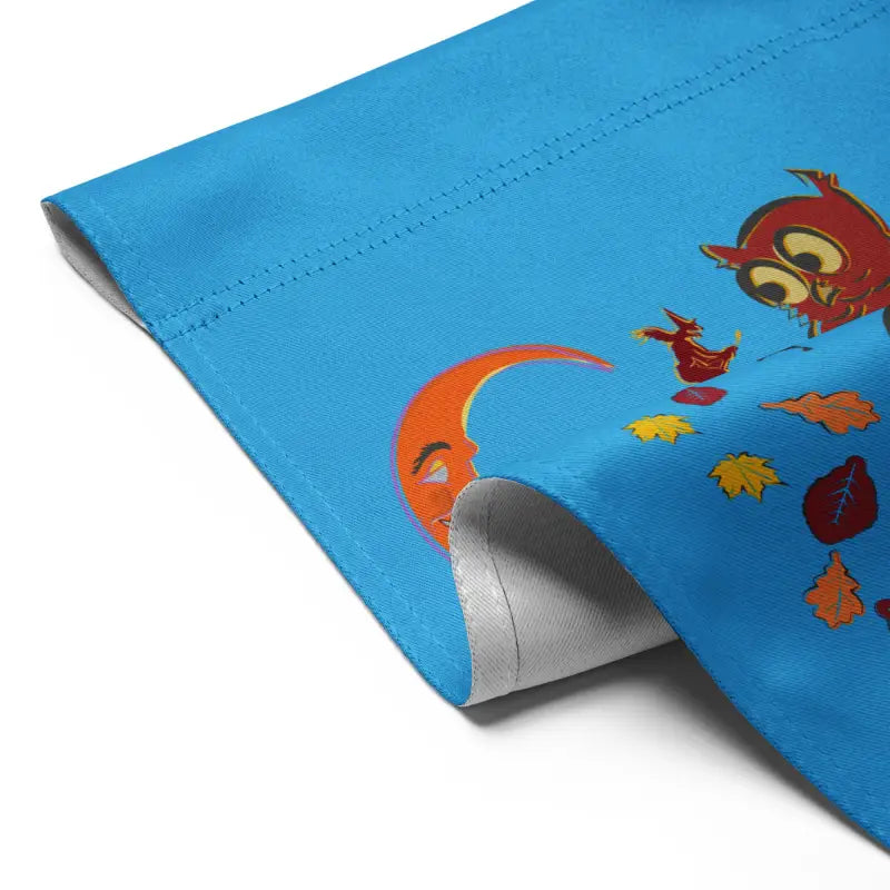 Blue fabric Halloween garden flag featuring cartoon moon, owl, and leaves for festive spirit